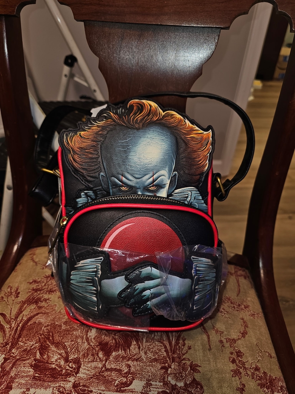 Pennywise bag is a Crossbuddies Cosplay Crossbody Loungefly